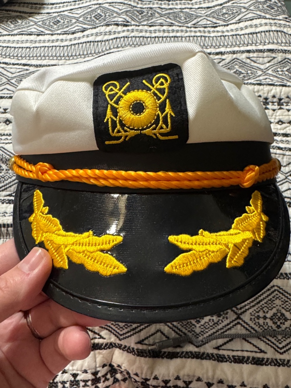 White and Black Captain's Hat with Yellow Embroidery